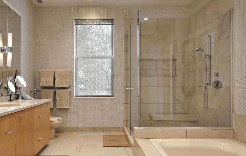 Glass shower doors can be a bit hard to clean. Source: Network Aia